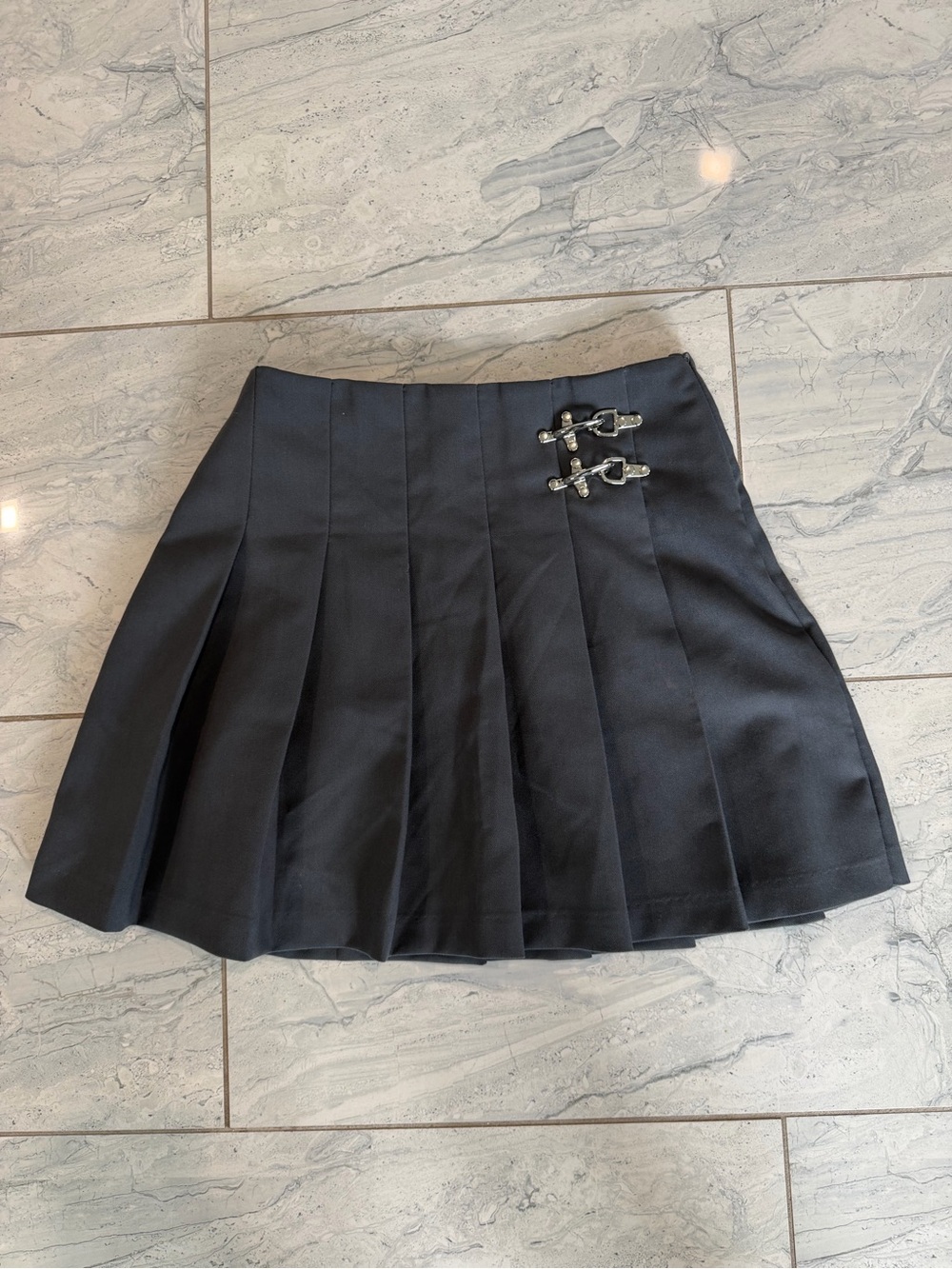 Black Pleated Mini Skirt with Silver Buckle Accents